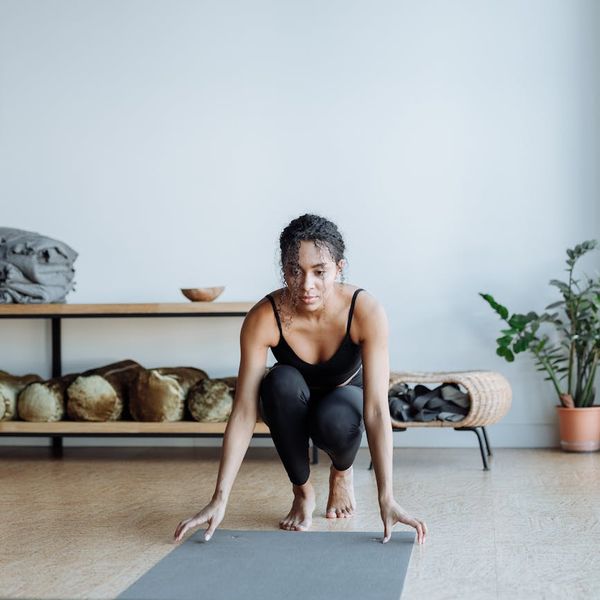 Person in a calm, focused pose, demonstrating body and mind harmony.